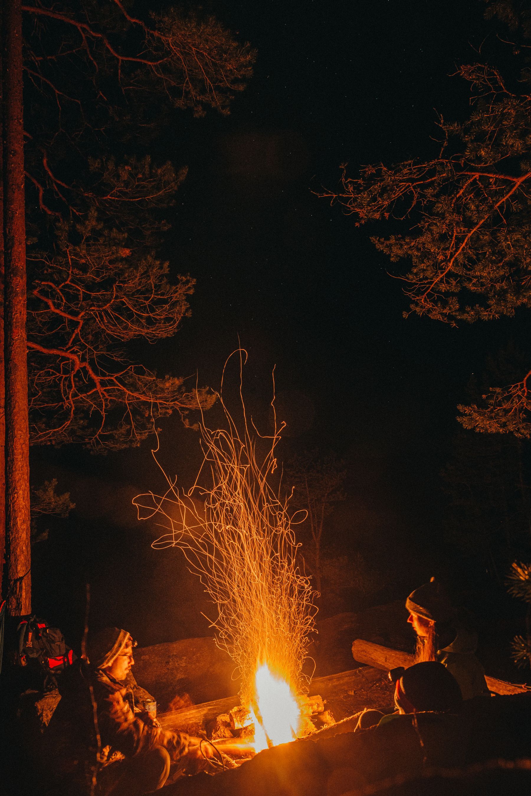 Sparks rising from a bonfire